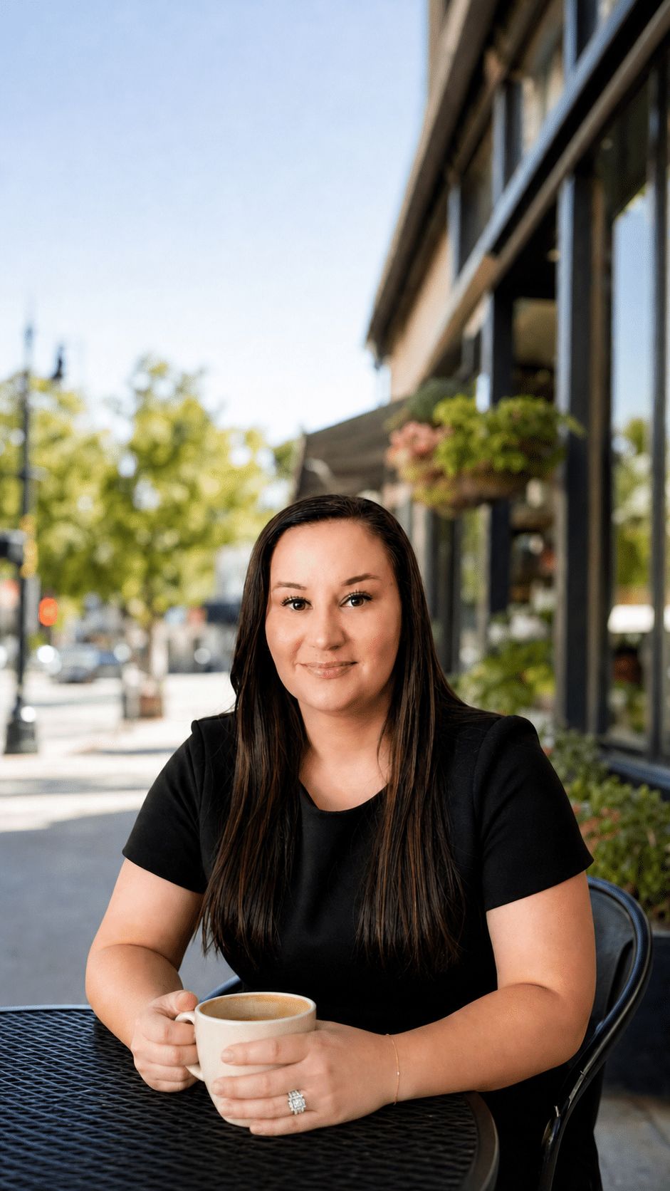 Bre Meador, REALTOR®, at a coffee shop in downtown Bastrop TX